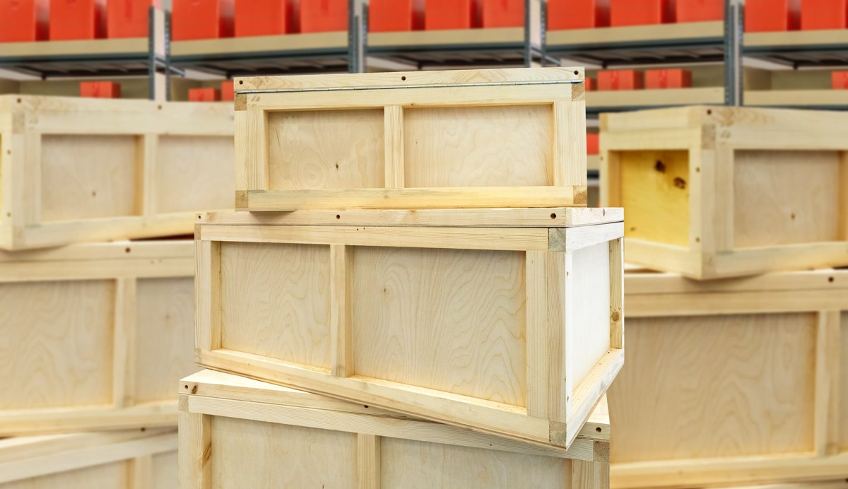 Wooden shipping crates stacked in a storage area